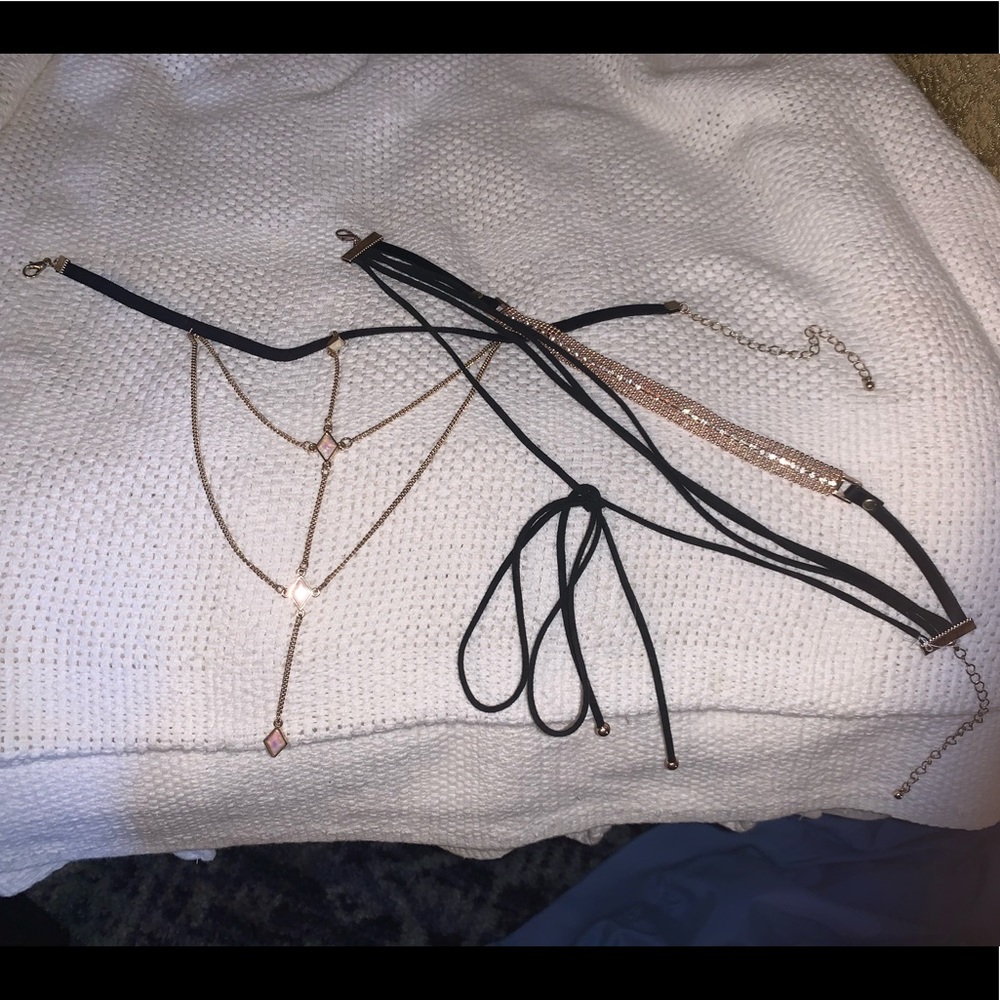 Two black dazzling chokers